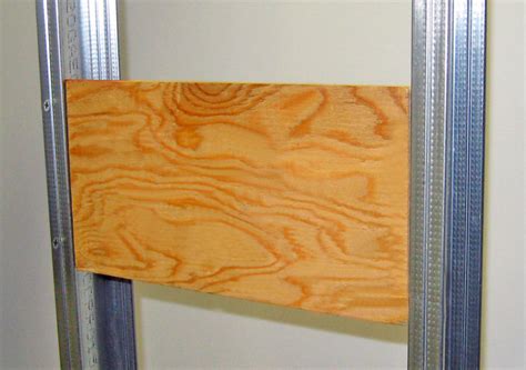 what screw for attaching metal brackets to plywood|how to secure plywood blocking.